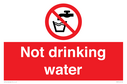 water-prohibited-symbol-in-prohibition-circle-white-text-on-red-background~